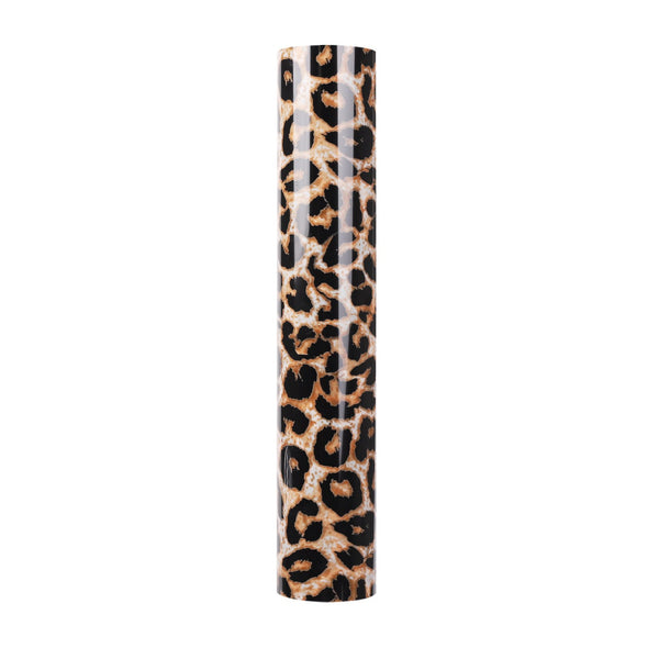 Leopard: A large realistic colored leopard print. The leopard spots are black, outlined with splotchy cider brown and ona a porcelain white background color. There are splotches of latte tan in between. Animal print heat transfer vinyl 